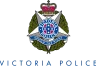 Victoria Police badge emblem with a crown, laurel wreath, and blue circular center reading Victoria Police; motto Uphold the Right on a blue ribbon.